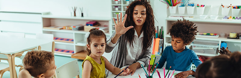 Woman working with children