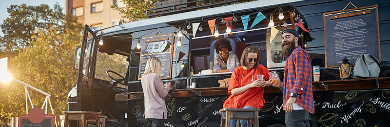 Food truck with customers outside