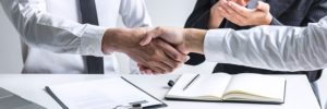 business men shaking hands after a successful interview