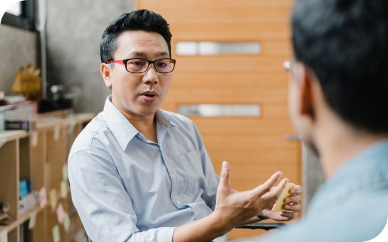 Man talking with another