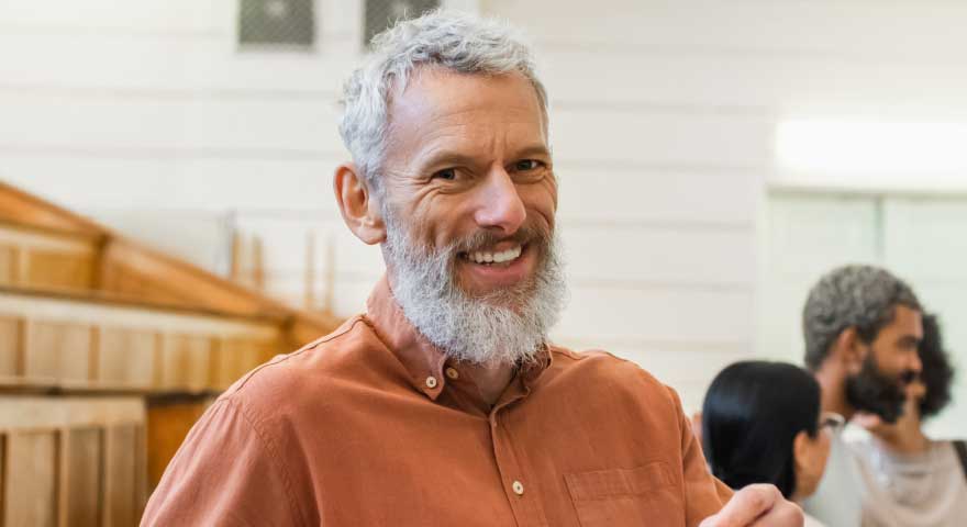 headshot of man smiling