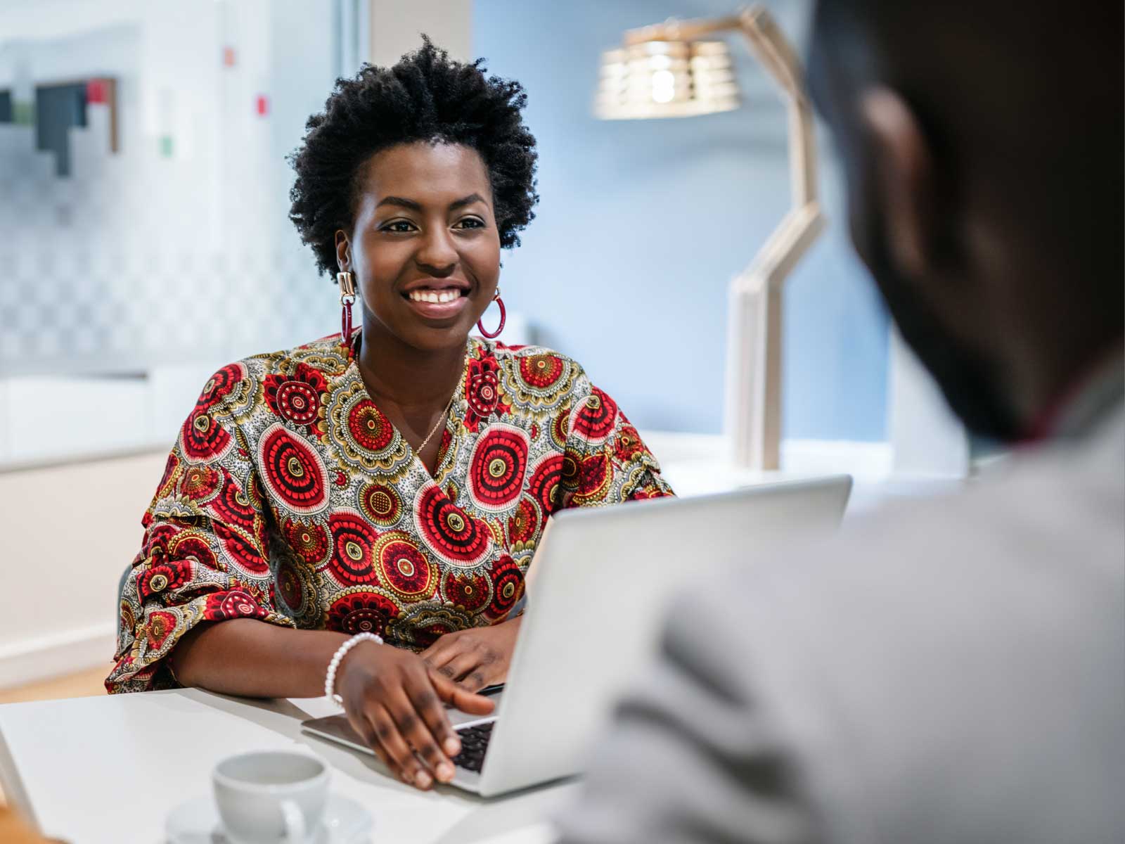 Woman smiling with laptop